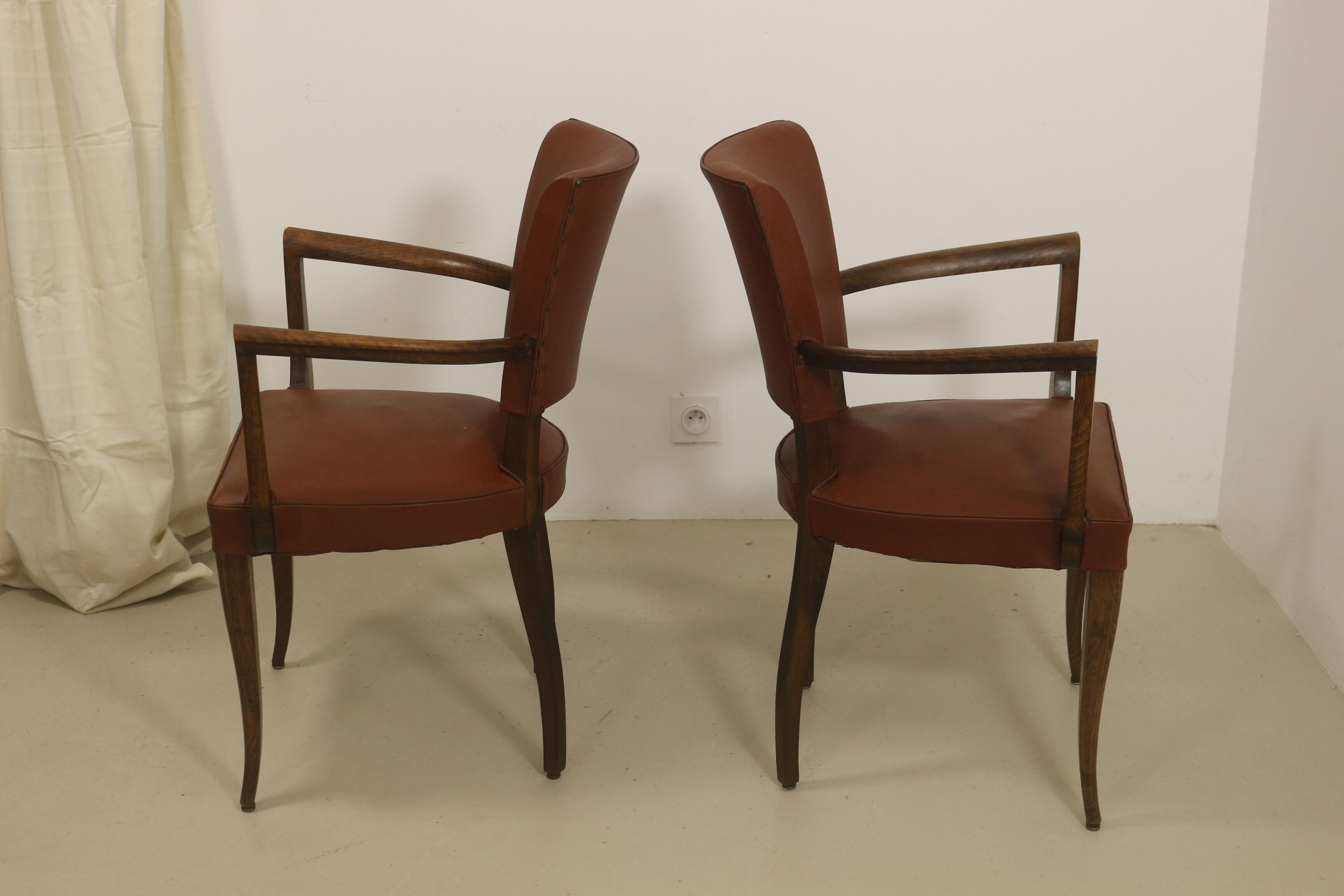 Pair of vintage bridge armchairs year 60 in imitation rust leather.