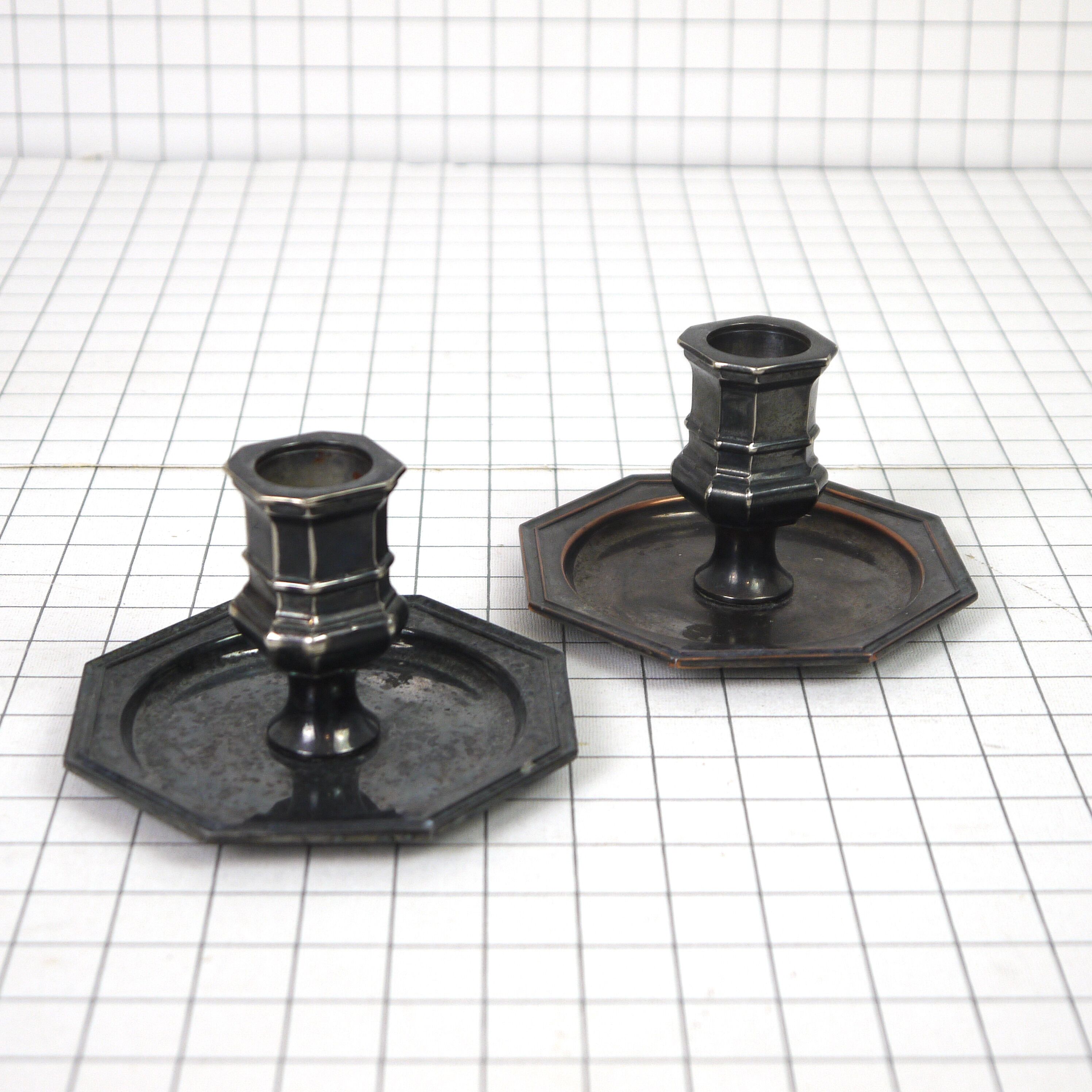 Pair of metal candlesticks