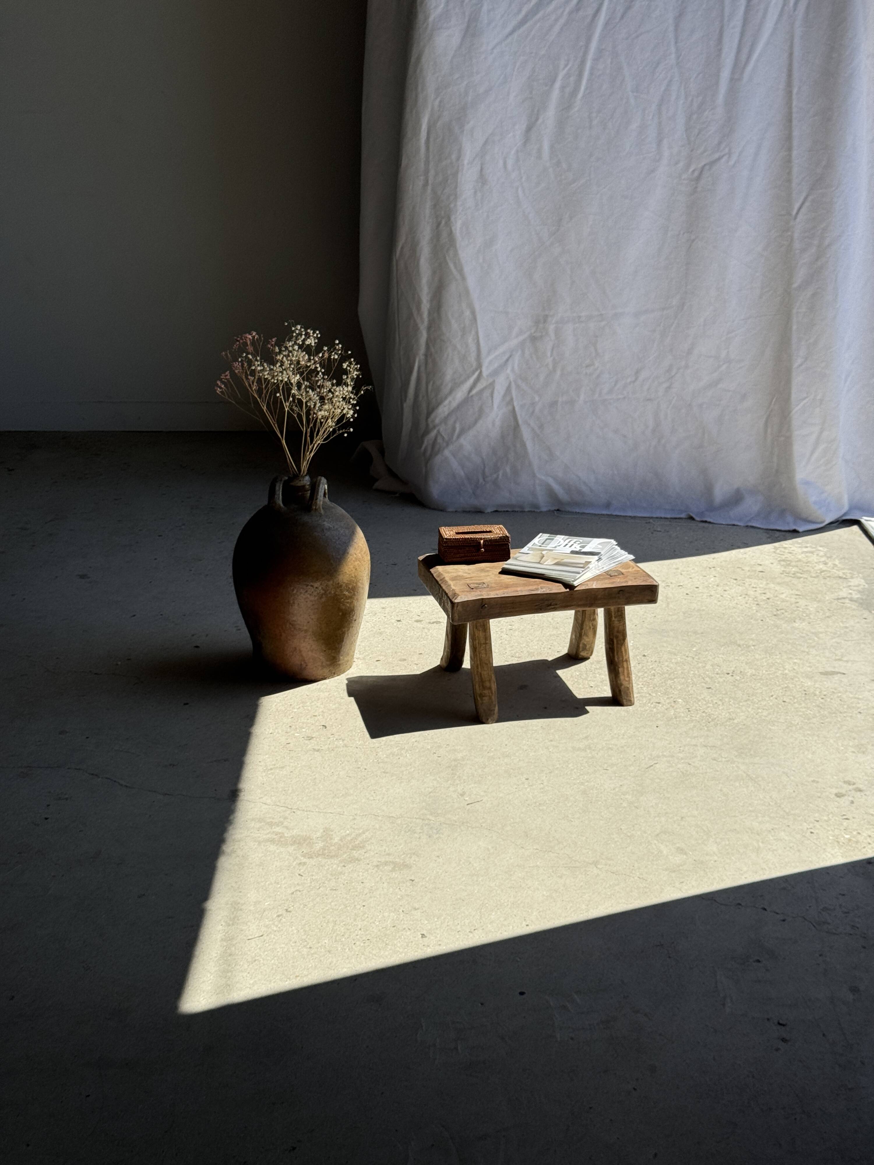Small stool, rectangular curved accent stool in solid teak.
