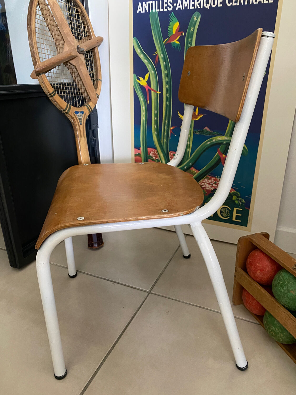 Old wooden and metal children's school chair