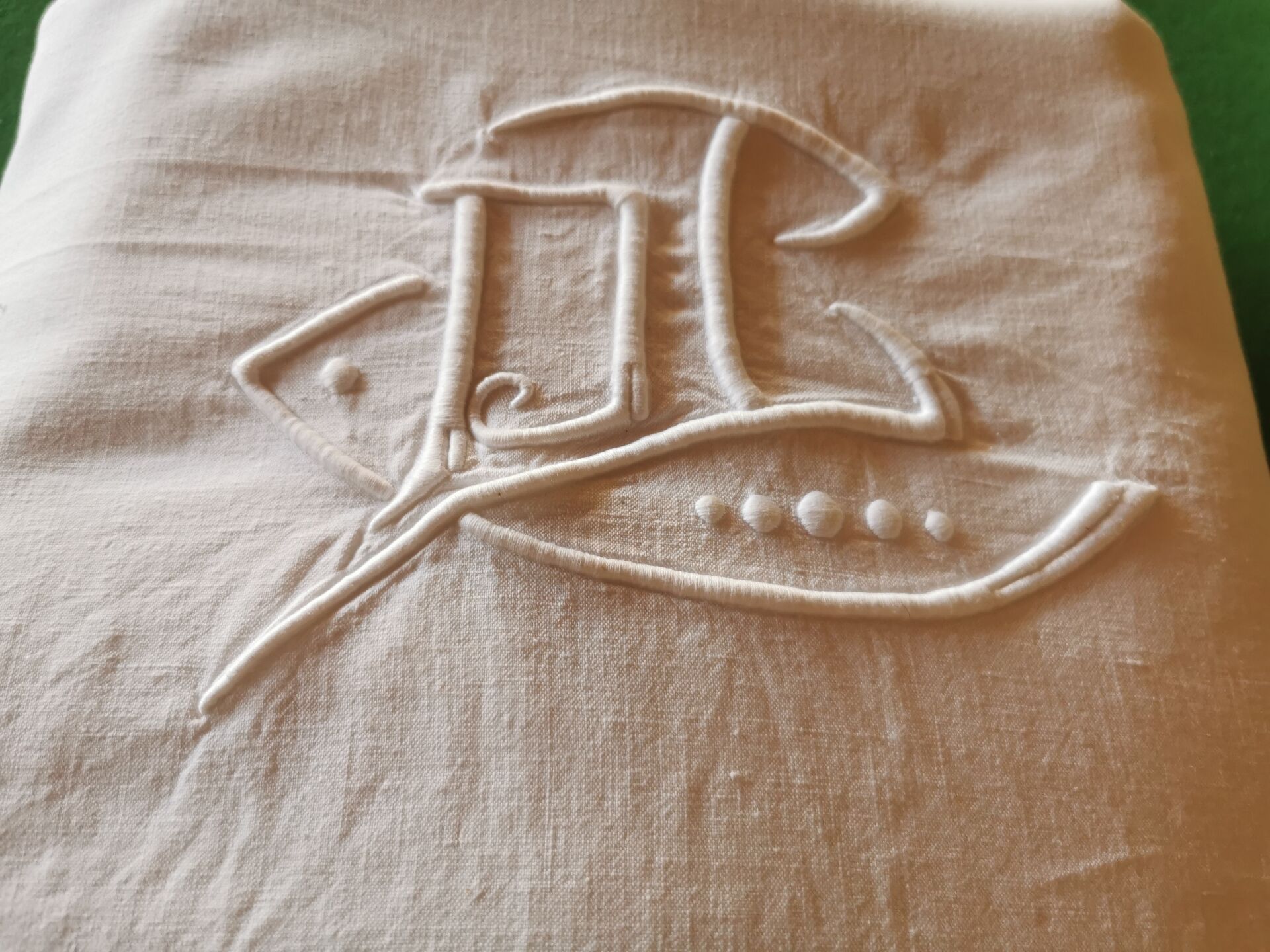 Old monogrammed fabric