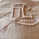 Old monogrammed fabric