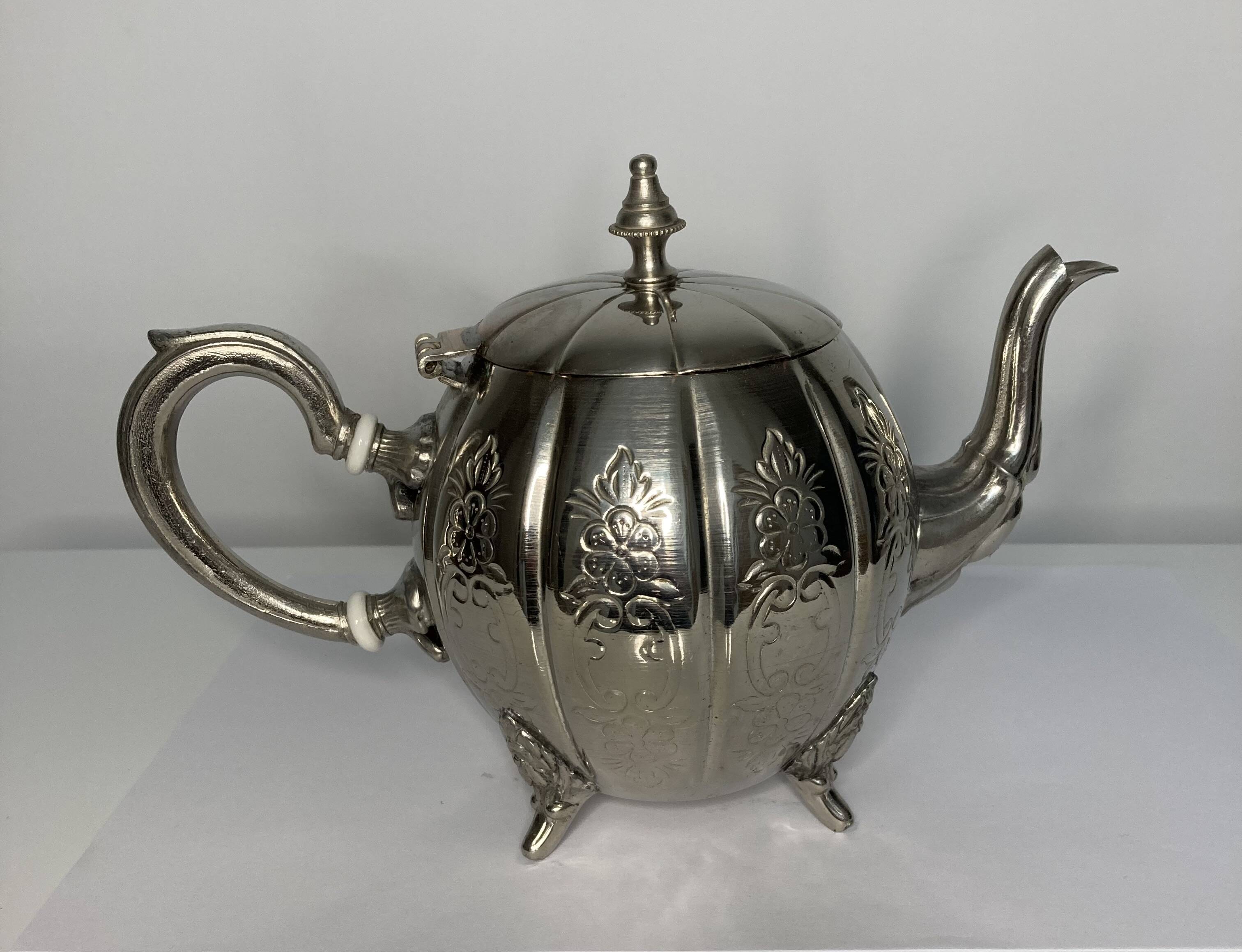 Vintage silver metal teapot from the 1930s