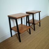 A pair of bedside tables