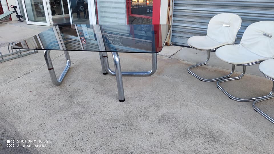 Table on top of glass and base in chromed metal around 1970 modular