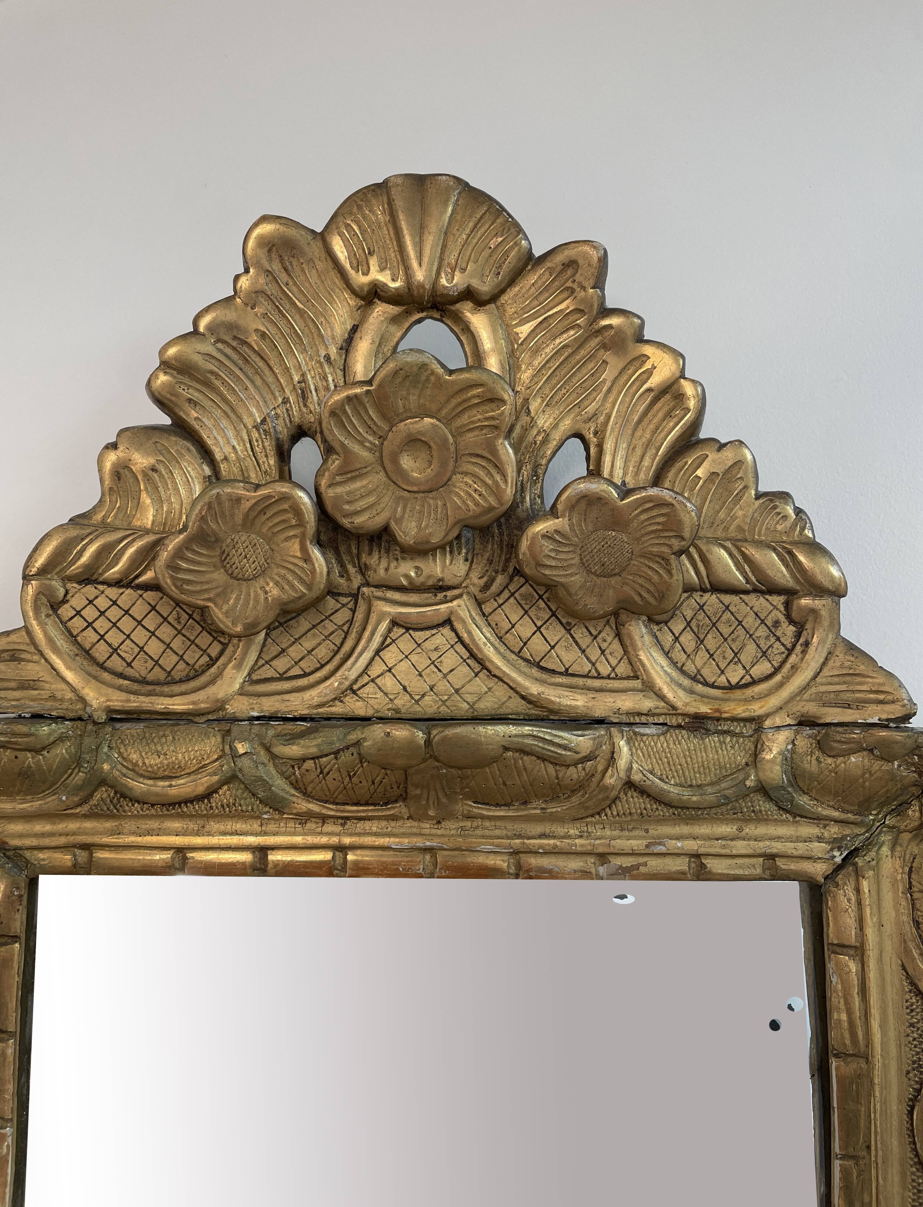 18th century mirror, Louis XVI period, gilded carved wood