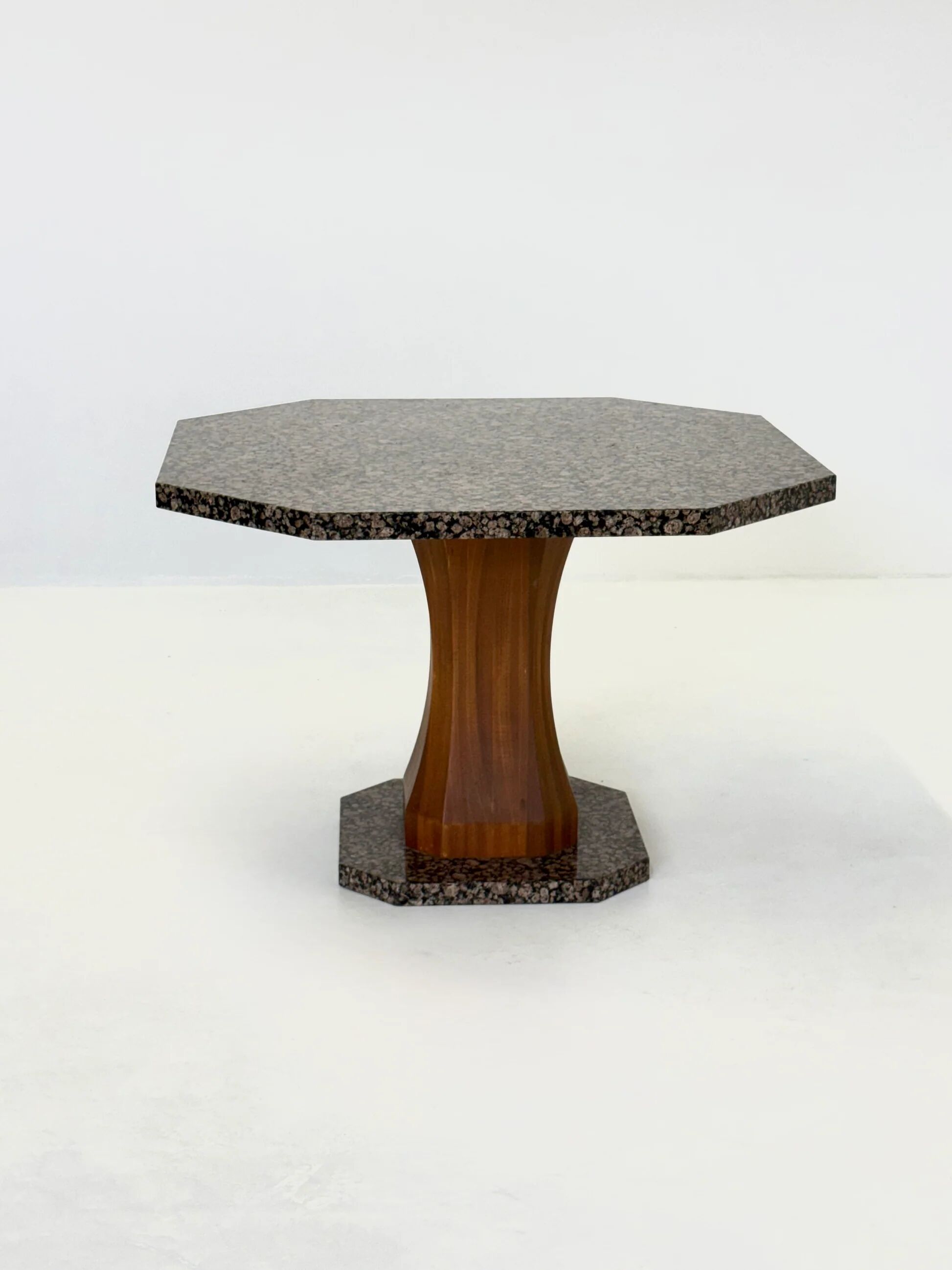 Art Deco dining table with octagonal granite top