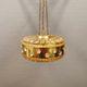 Ceiling-hanging lamp in glass with prisms and metal details