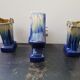 Art deco mantel clock with 2 vintage blue and white ceramic vases