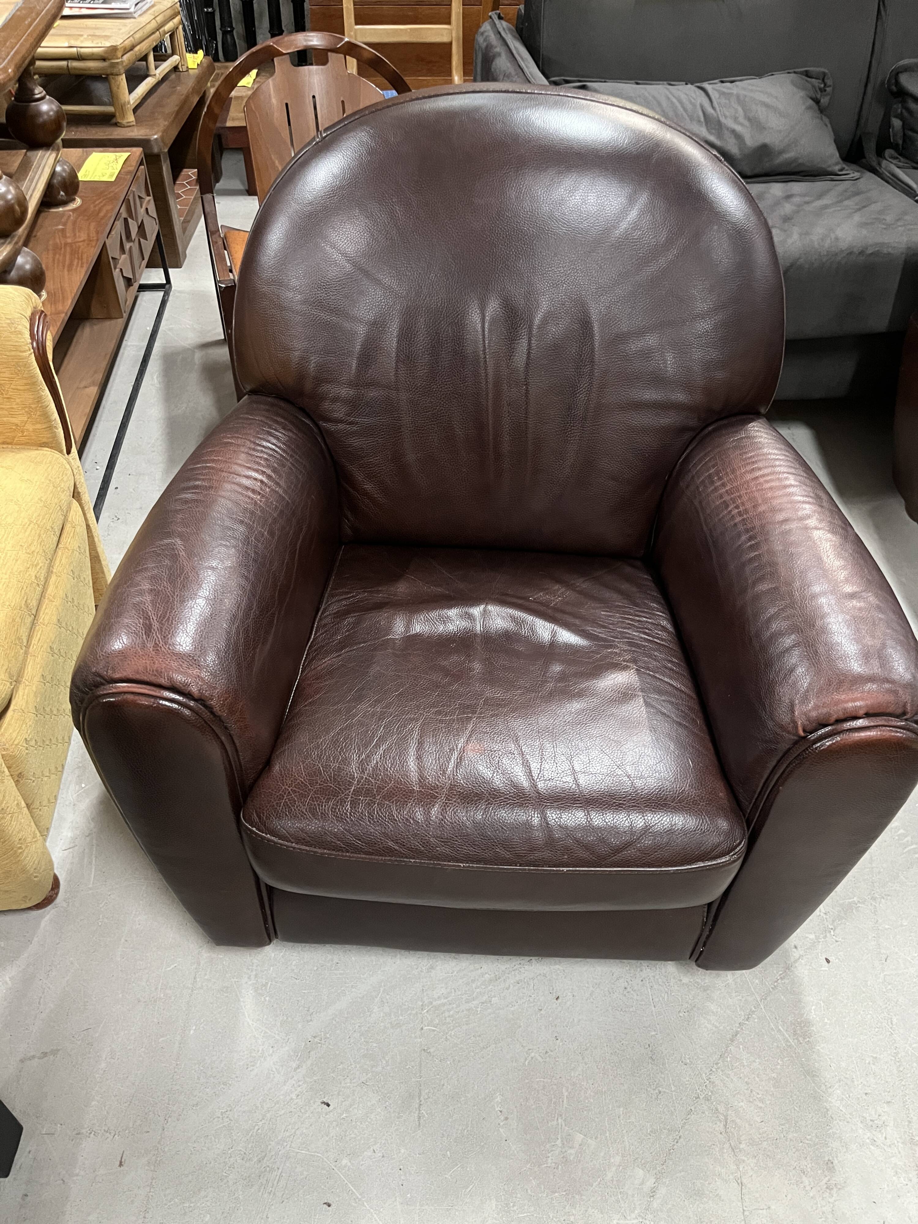 Brown leather club chair