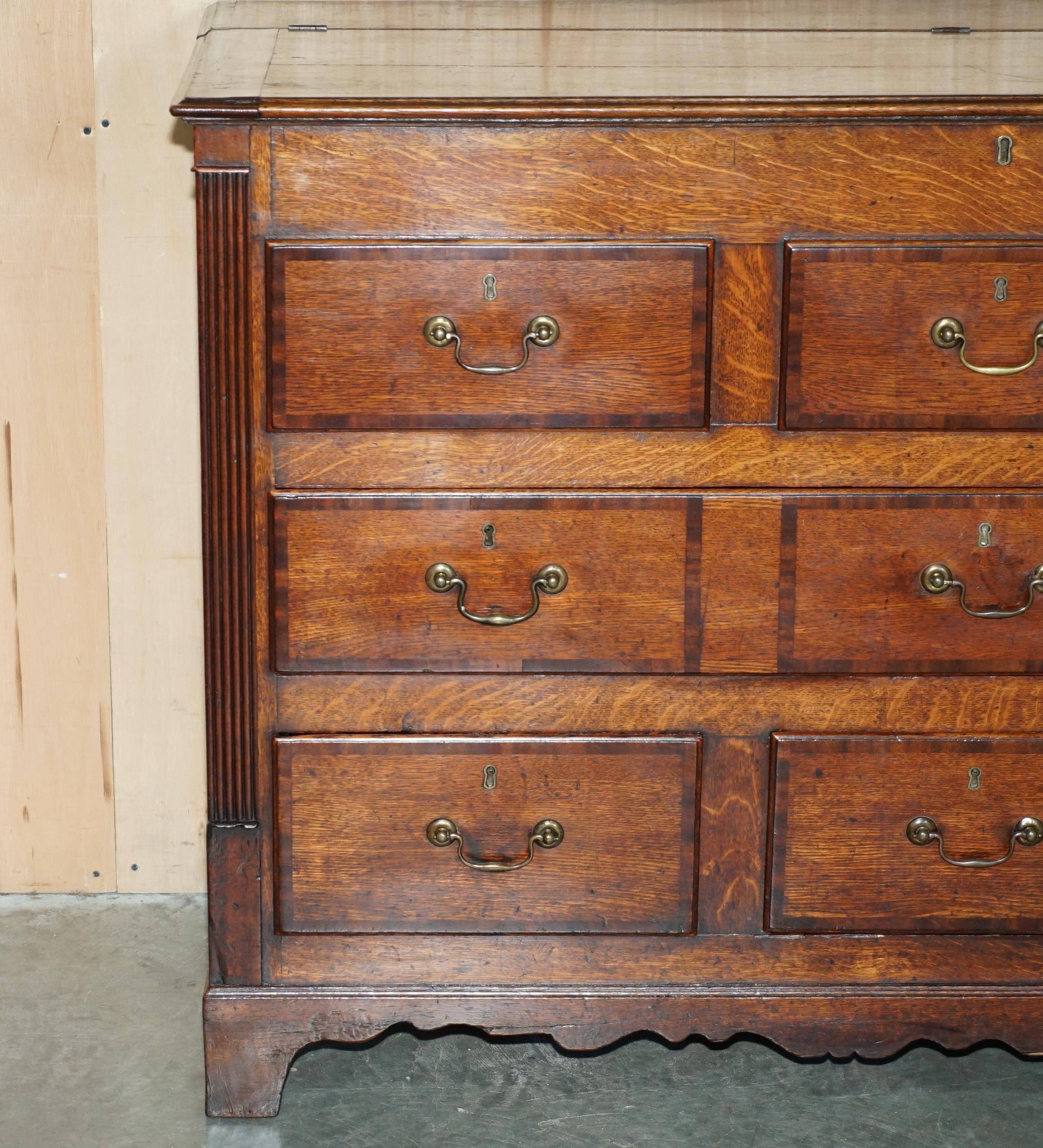 Georgian oak commode with a folding top, English, 18th century.