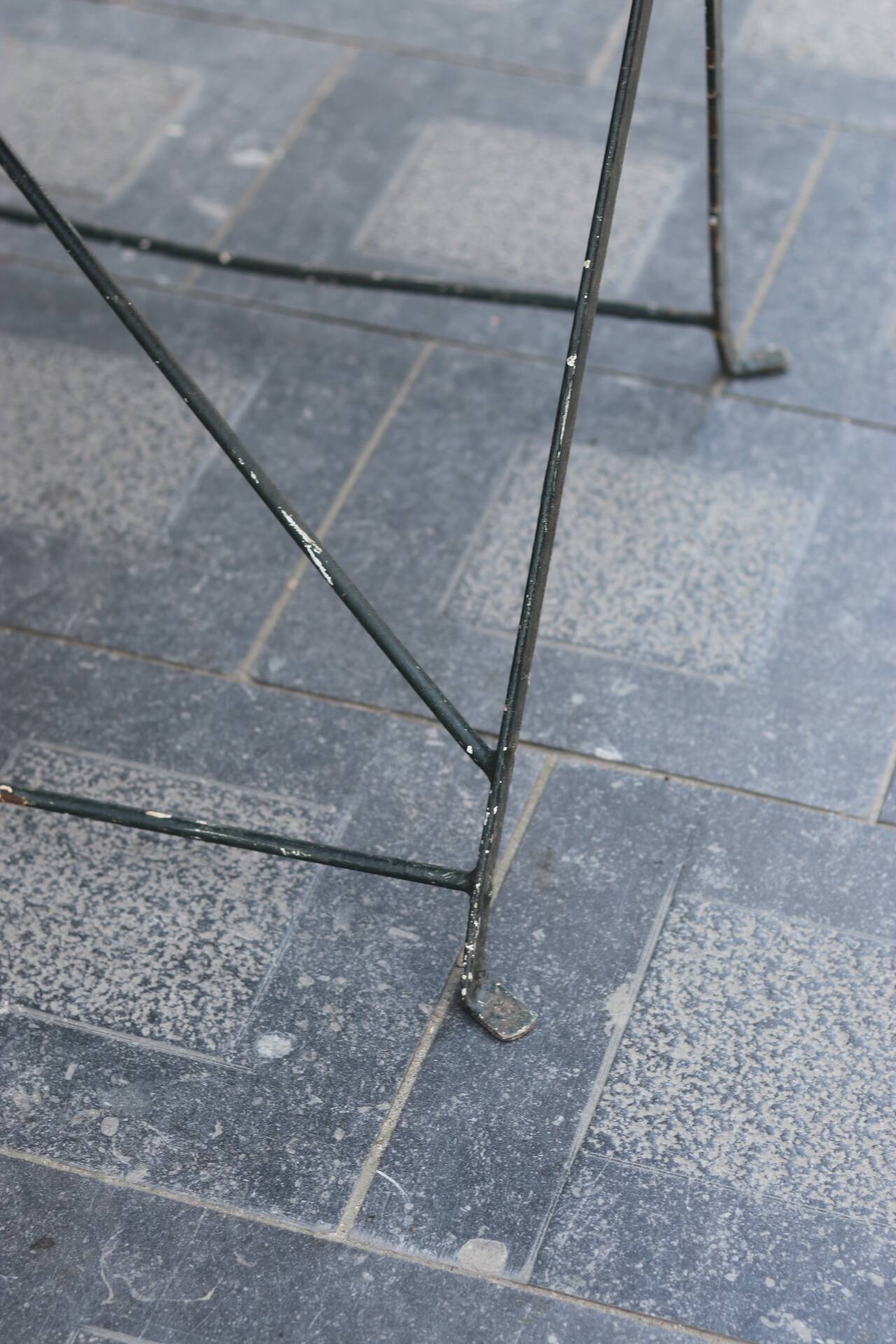 Folding wrought iron garden table