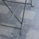 Folding wrought iron garden table