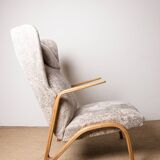 High armchair in curved beech and recent konkav fabric model by paul bode for federholz.