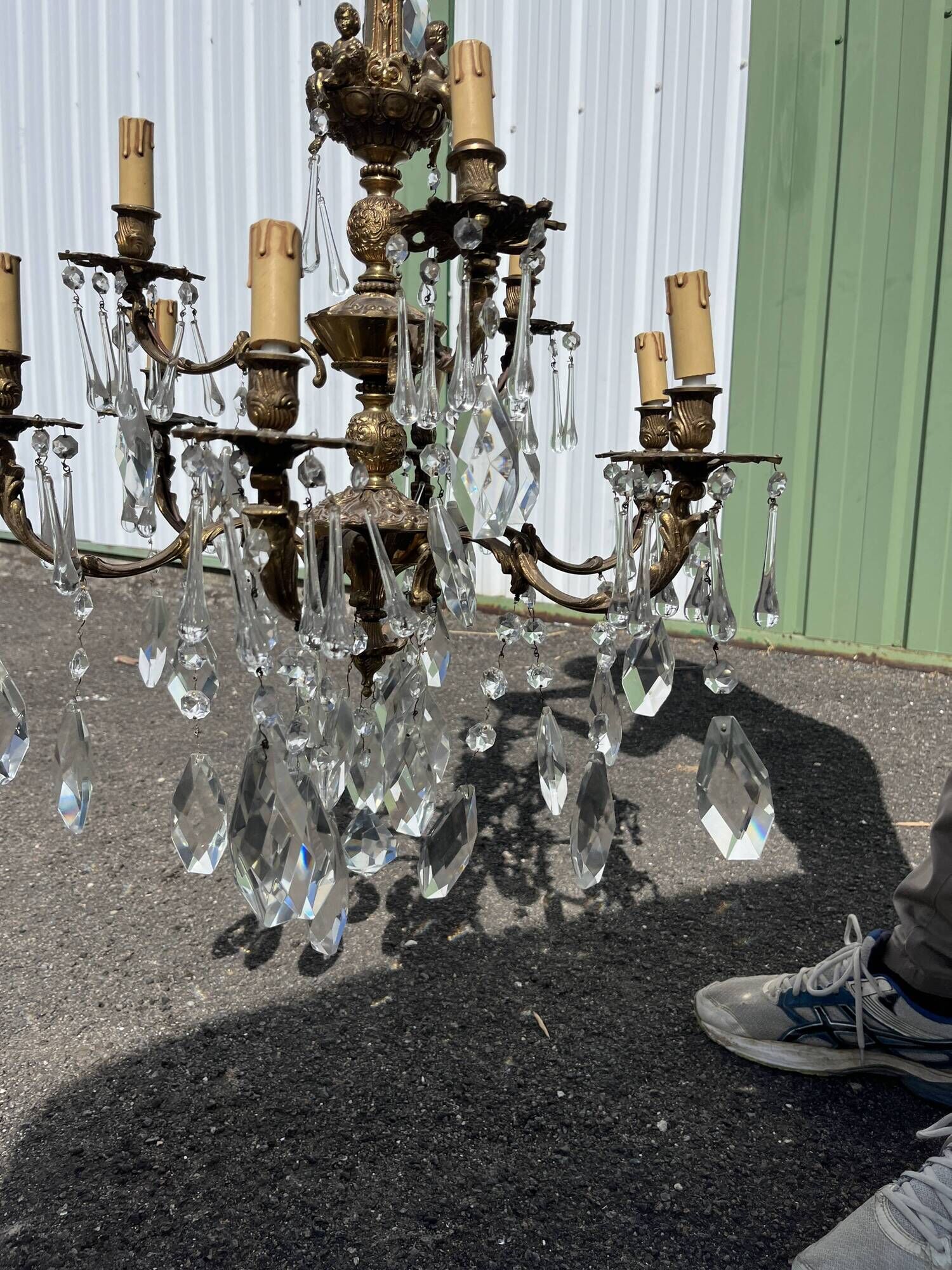 Large antique chandelier with 9 lights, bronze and cut glass pendants, cherubs, style