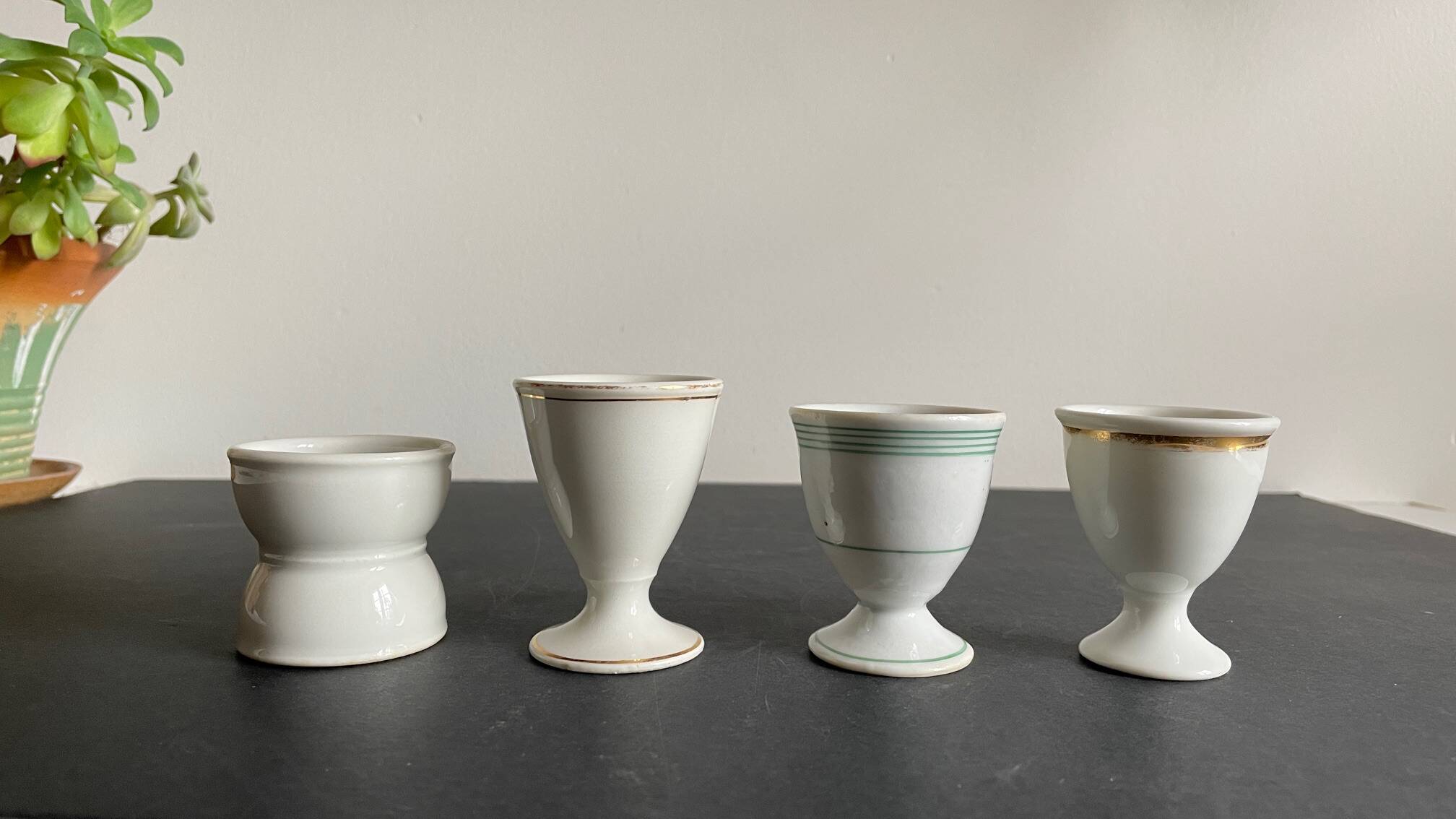 4 antique ceramic egg cups