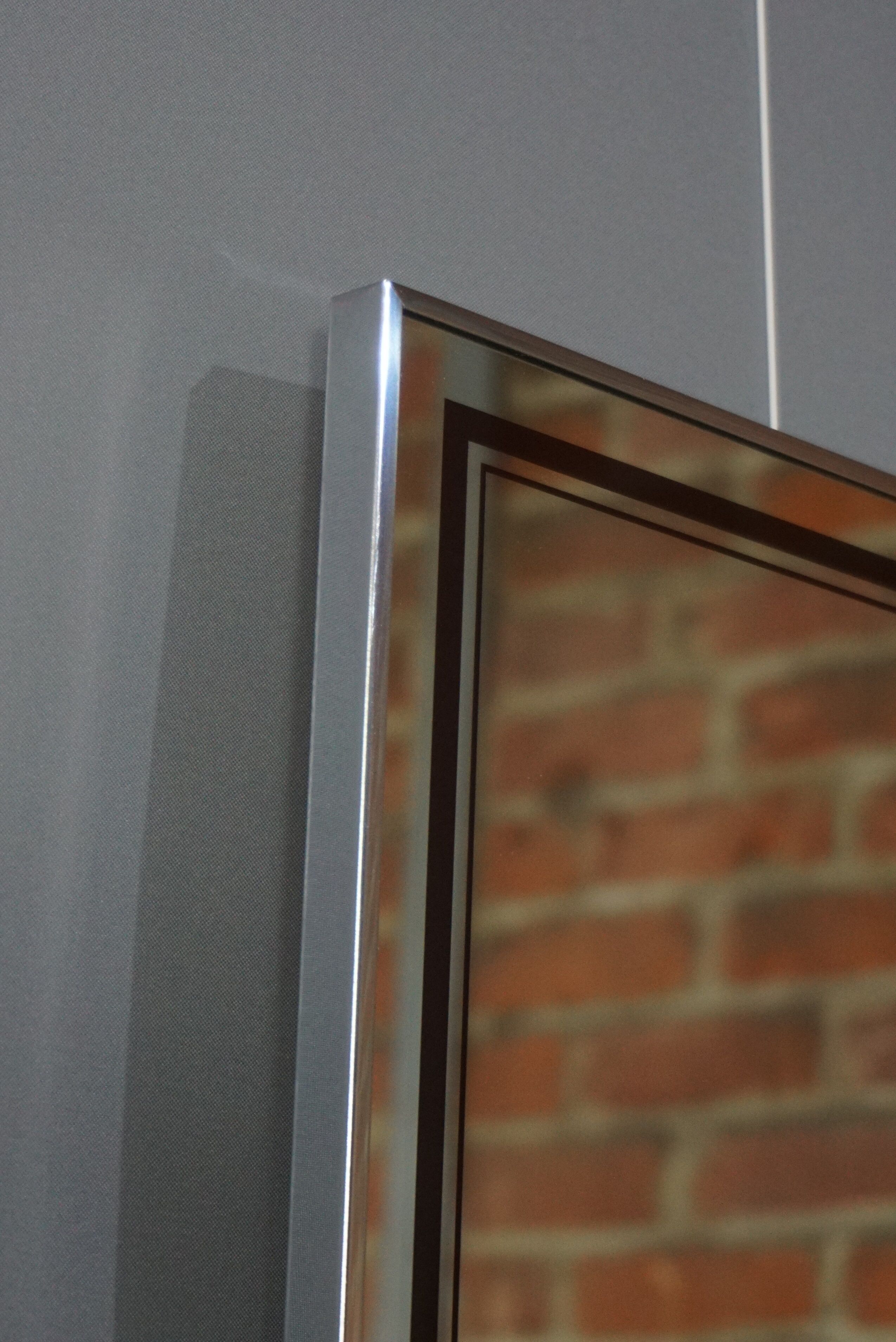 Chrome and screen-printed Deknudt mirror