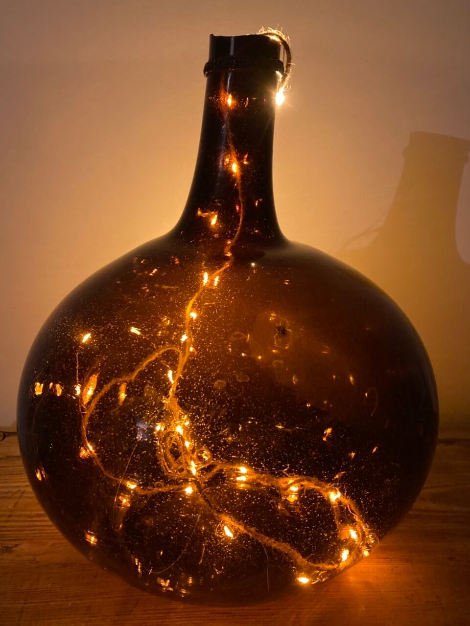 Old amber demijohn