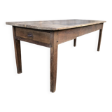 Antique farmhouse table in solid oak with tapered legs and 1 drawer at the end.