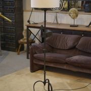 Wrought iron floor lamp in the style of the Marolles workshops from the 1950s.