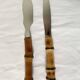 Bamboo handle cheese knives.