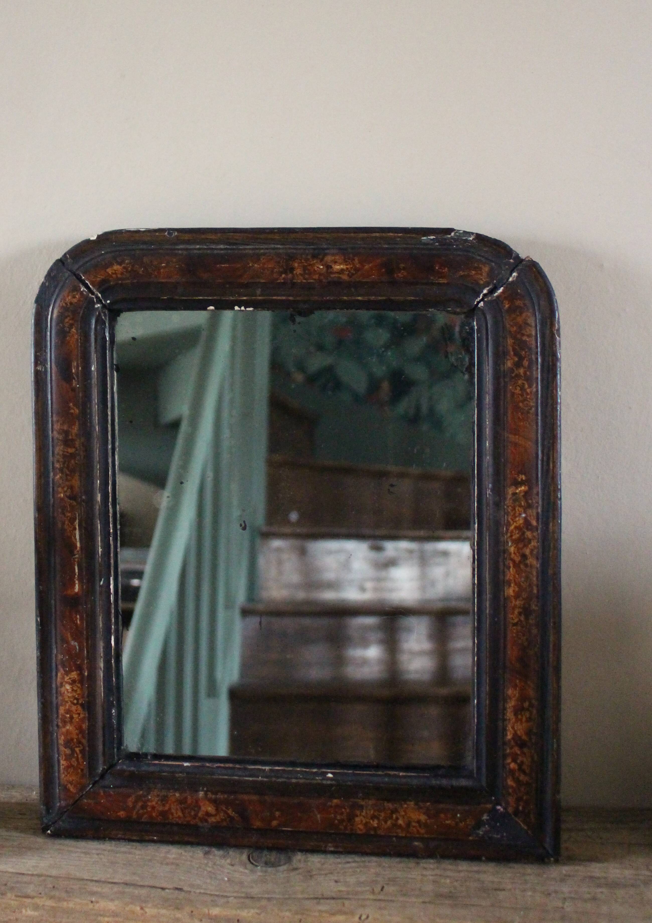 Antique Louis Philippe mirror in black and brown.