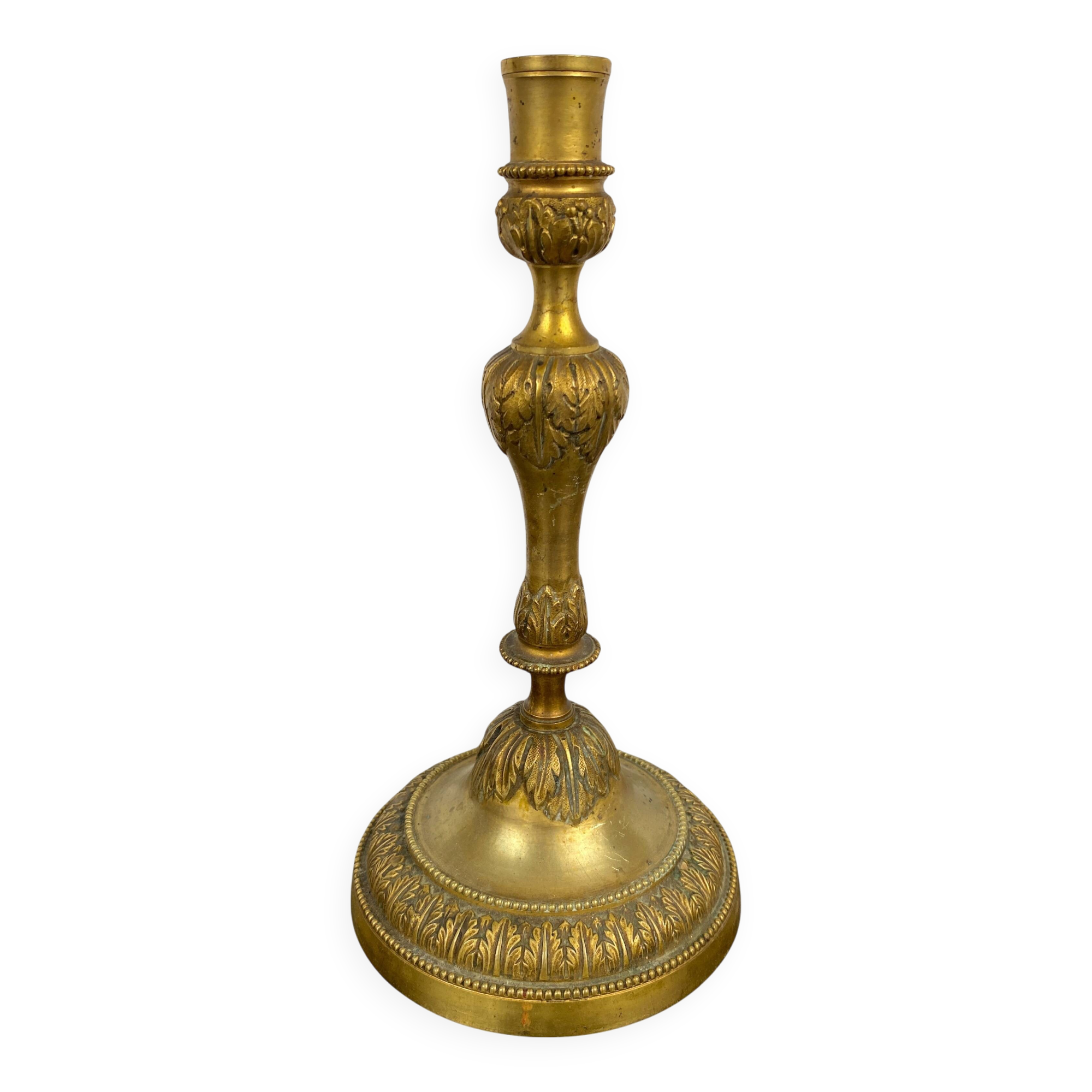 Louis XVI period candlestick in chiseled gilt bronze
