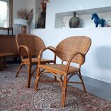 Pair of armchairs in braided rattan 70s