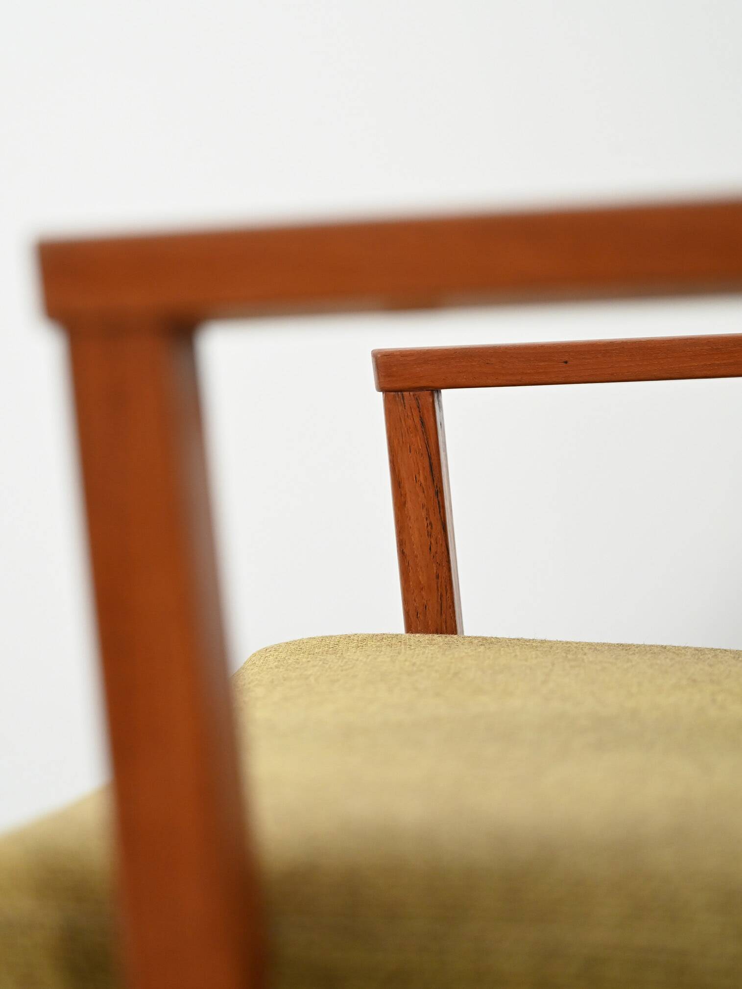 Pair of Danish teak armchairs with green upholstery