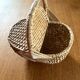 Handcrafted egg basket made of woven rattan and wicker