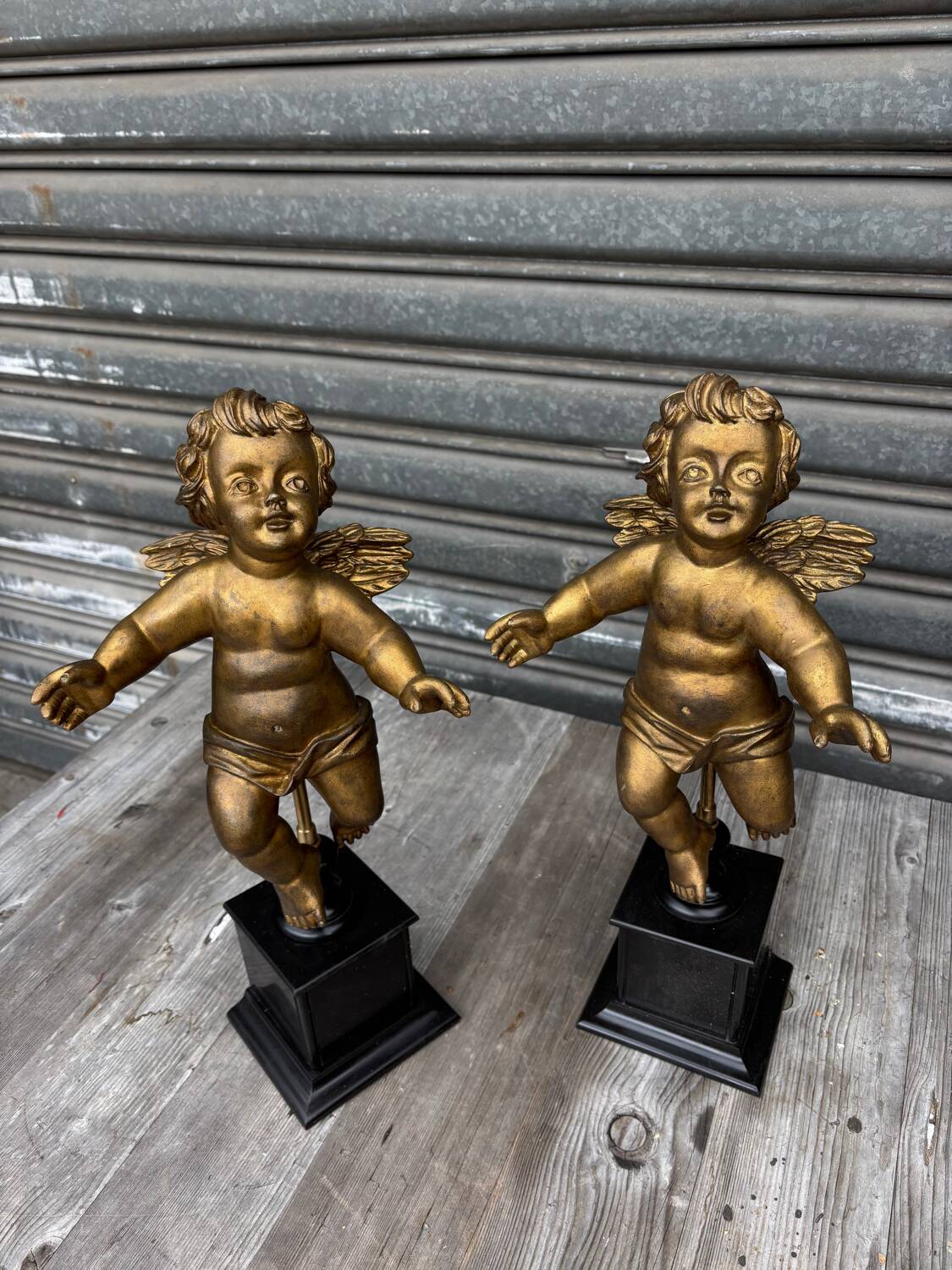Pair of gilded cherubs on a Napoléon III base