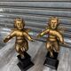 Pair of gilded cherubs on a Napoléon III base.