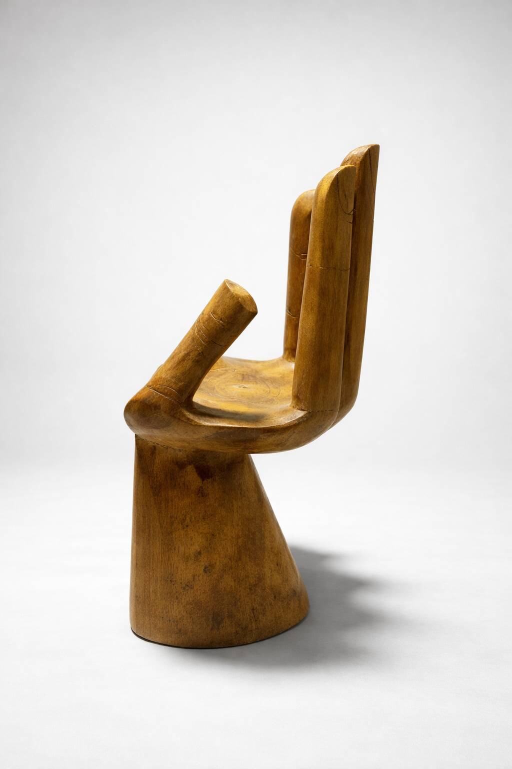 Sculptural wooden armchair – hand shape