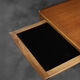 Classic vintage mid-century Scandinavian rosewood coffee table with a sliding black top.
