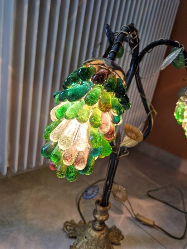 Bronze table lamp and Murano glass grape clusters.