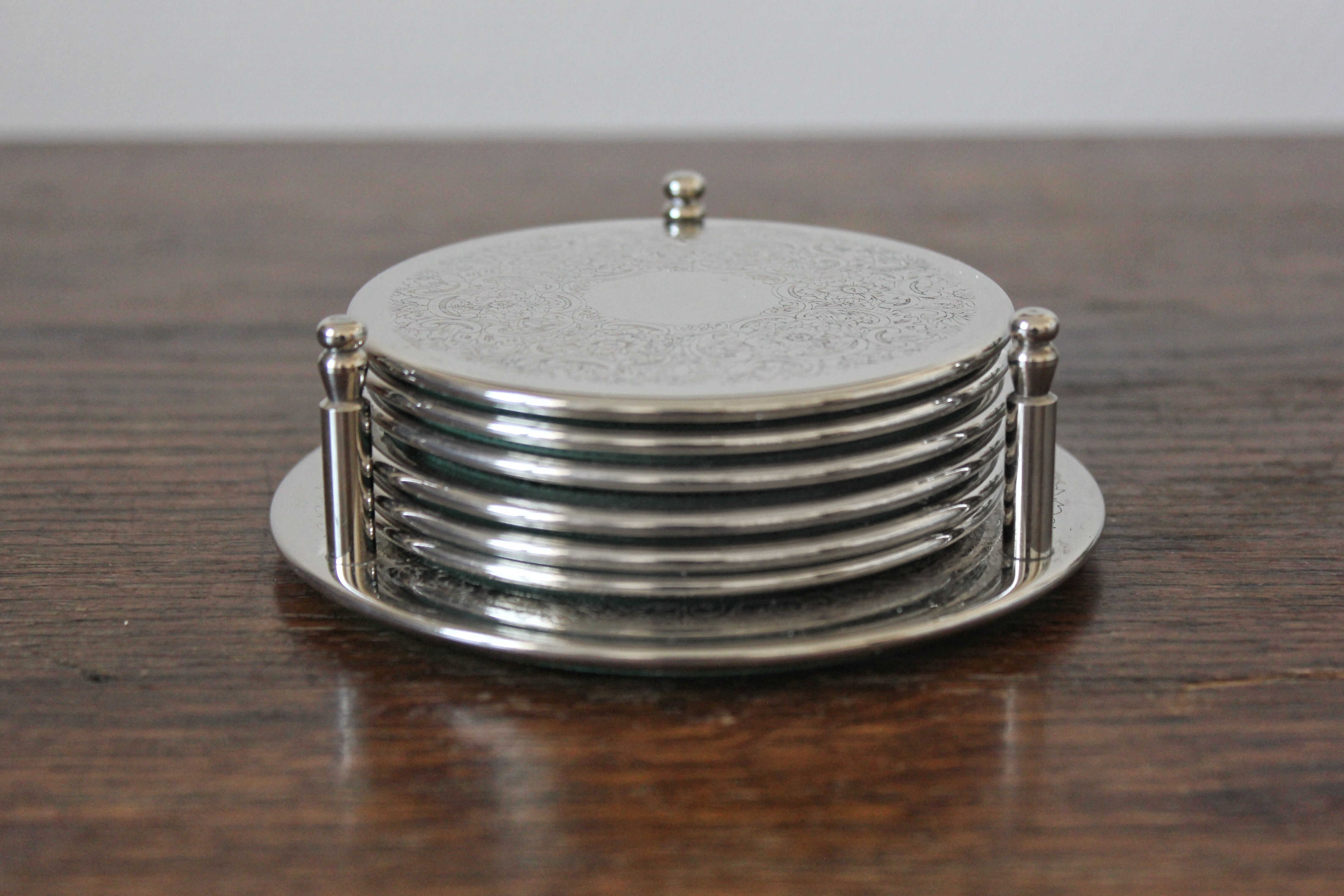 6 vintage chiseled silver metal coasters