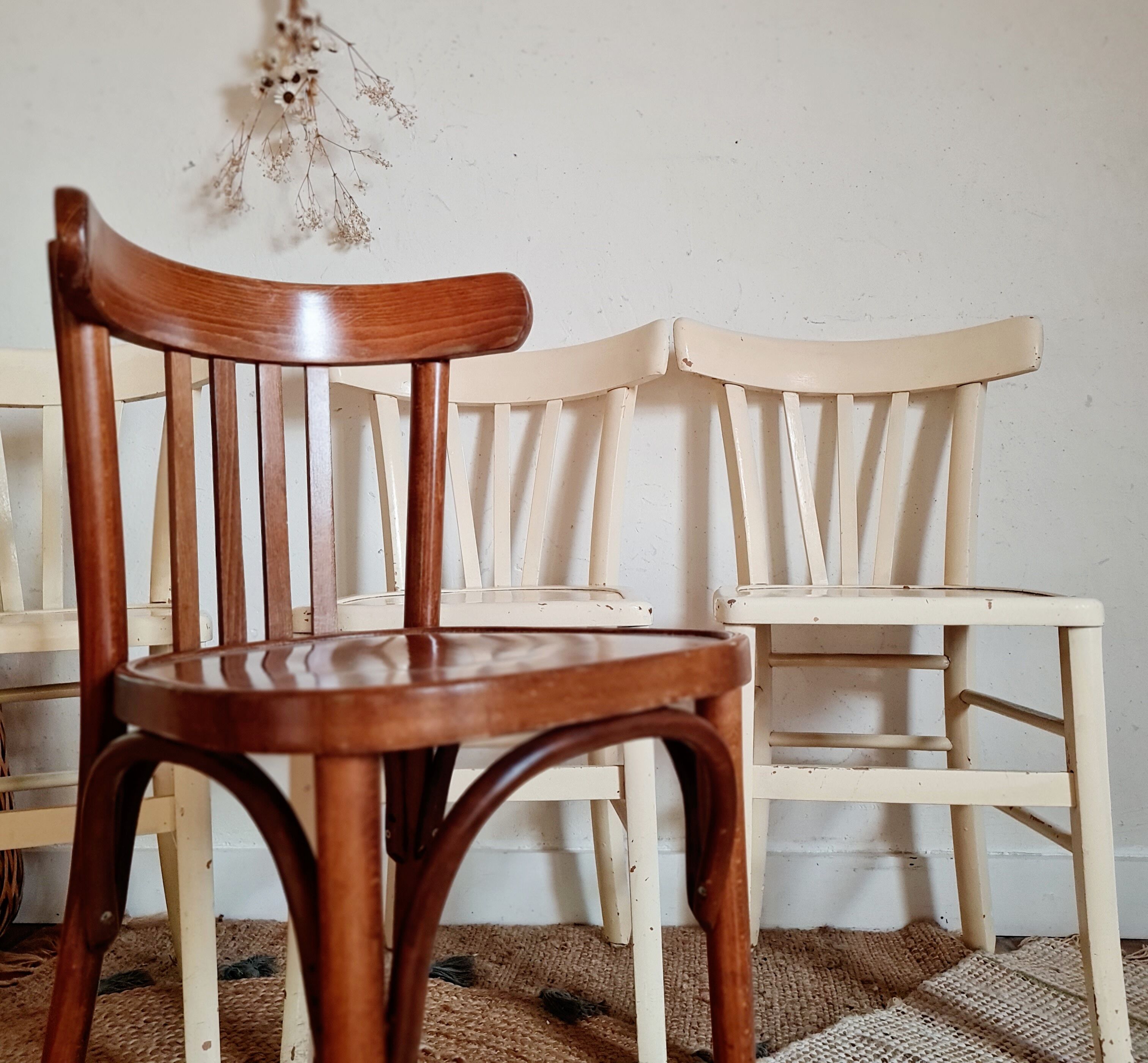 4 mismatched antique bistro chairs
