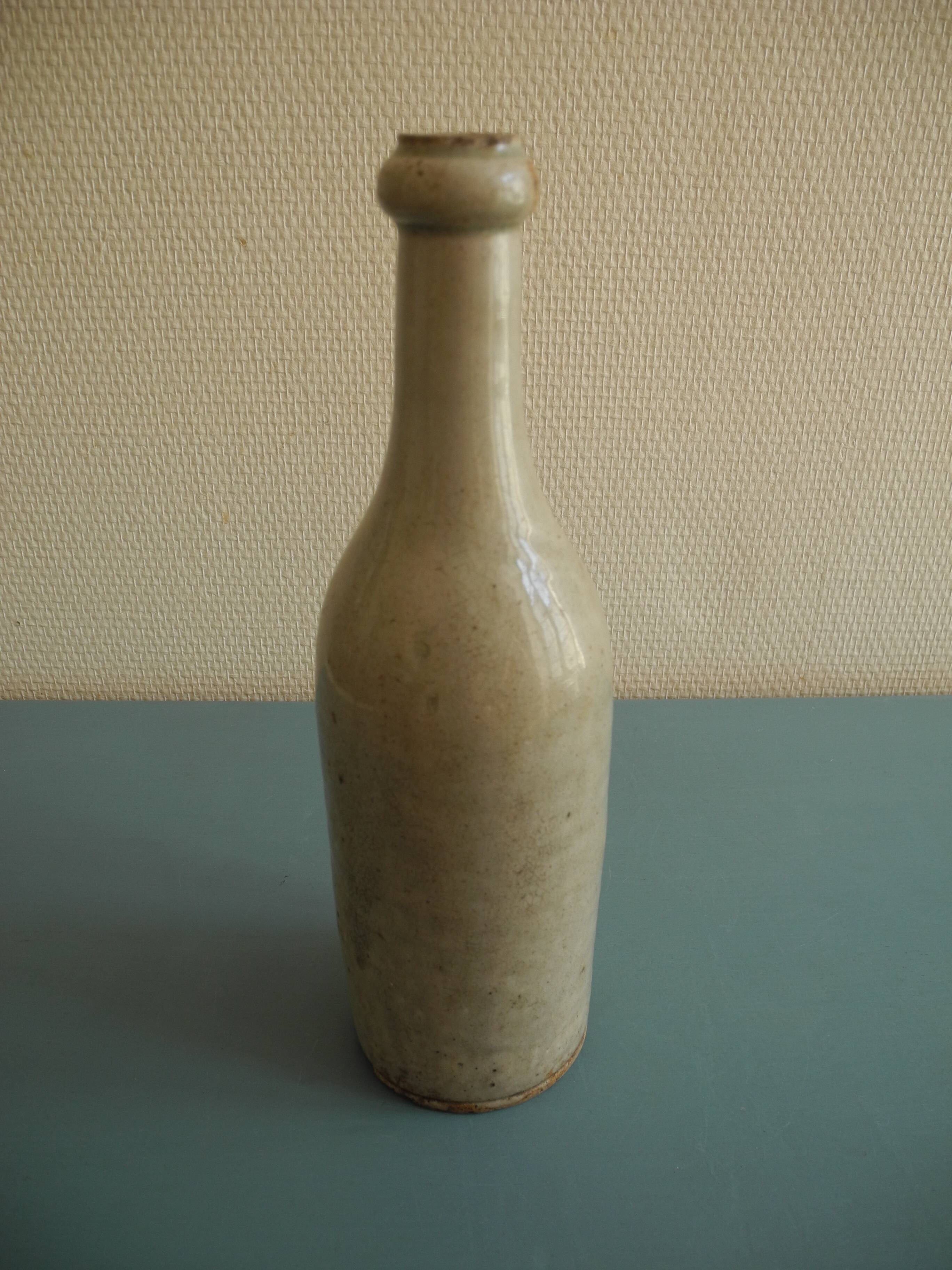 old stoneware bottle for oil wine rustic decor