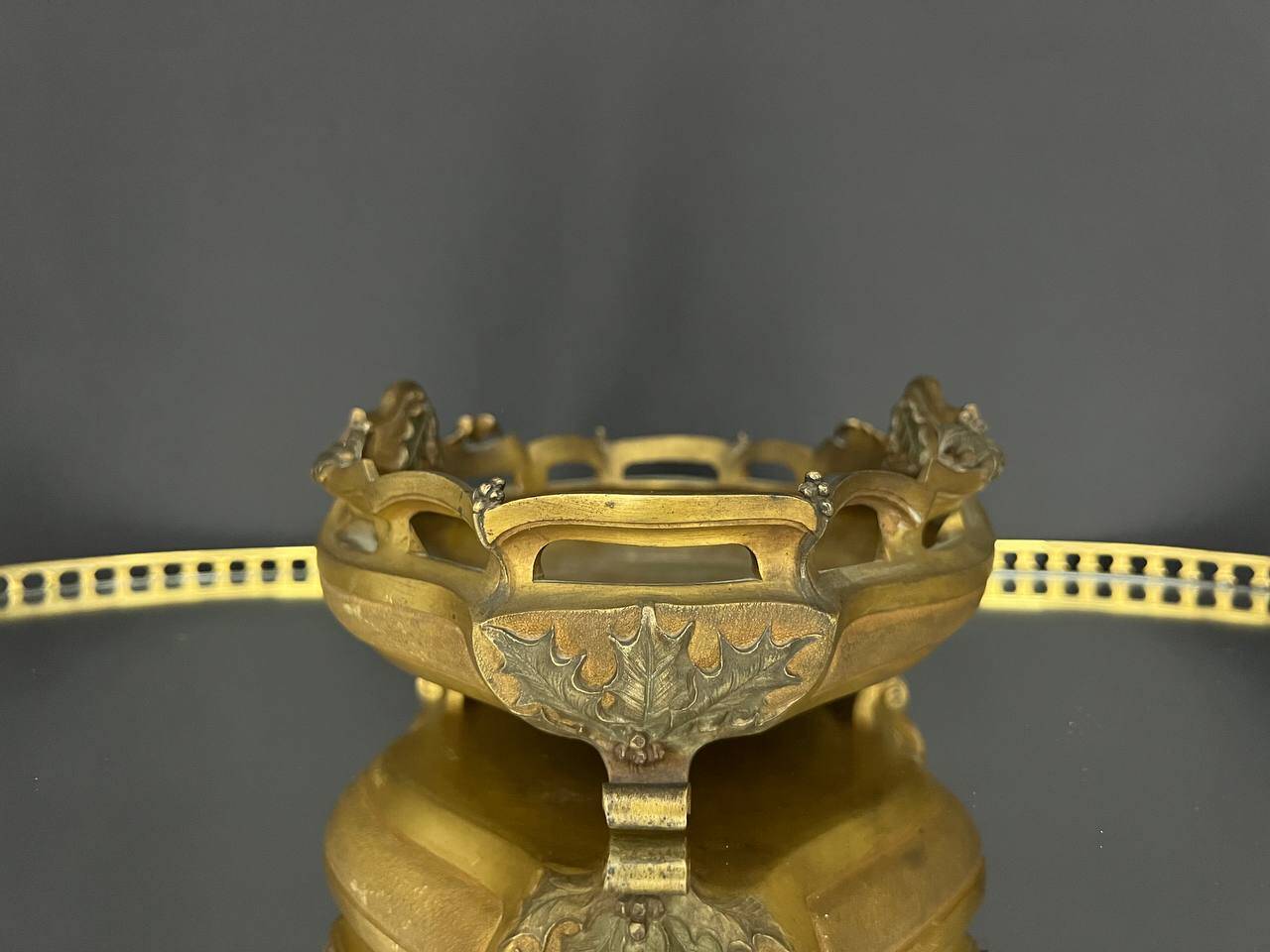 Art Nouveau jardinière in gilded bronze with holly decoration, signed E. Gros.