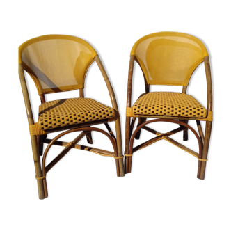 Two rattan bar armchairs