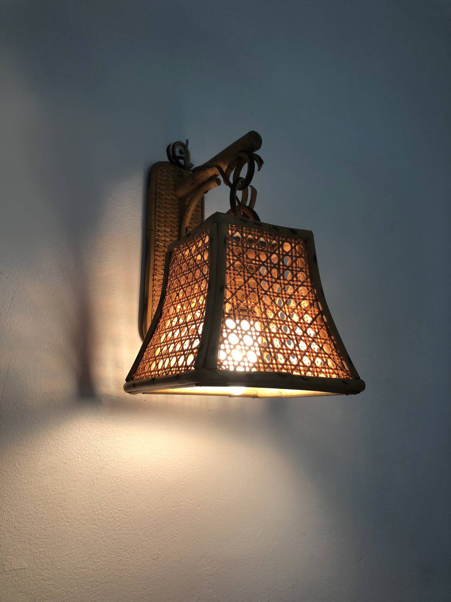 Pair of rattan and cane lantern wall lights. 1950s-1960s