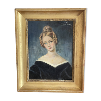 Portrait of young woman painting on wood