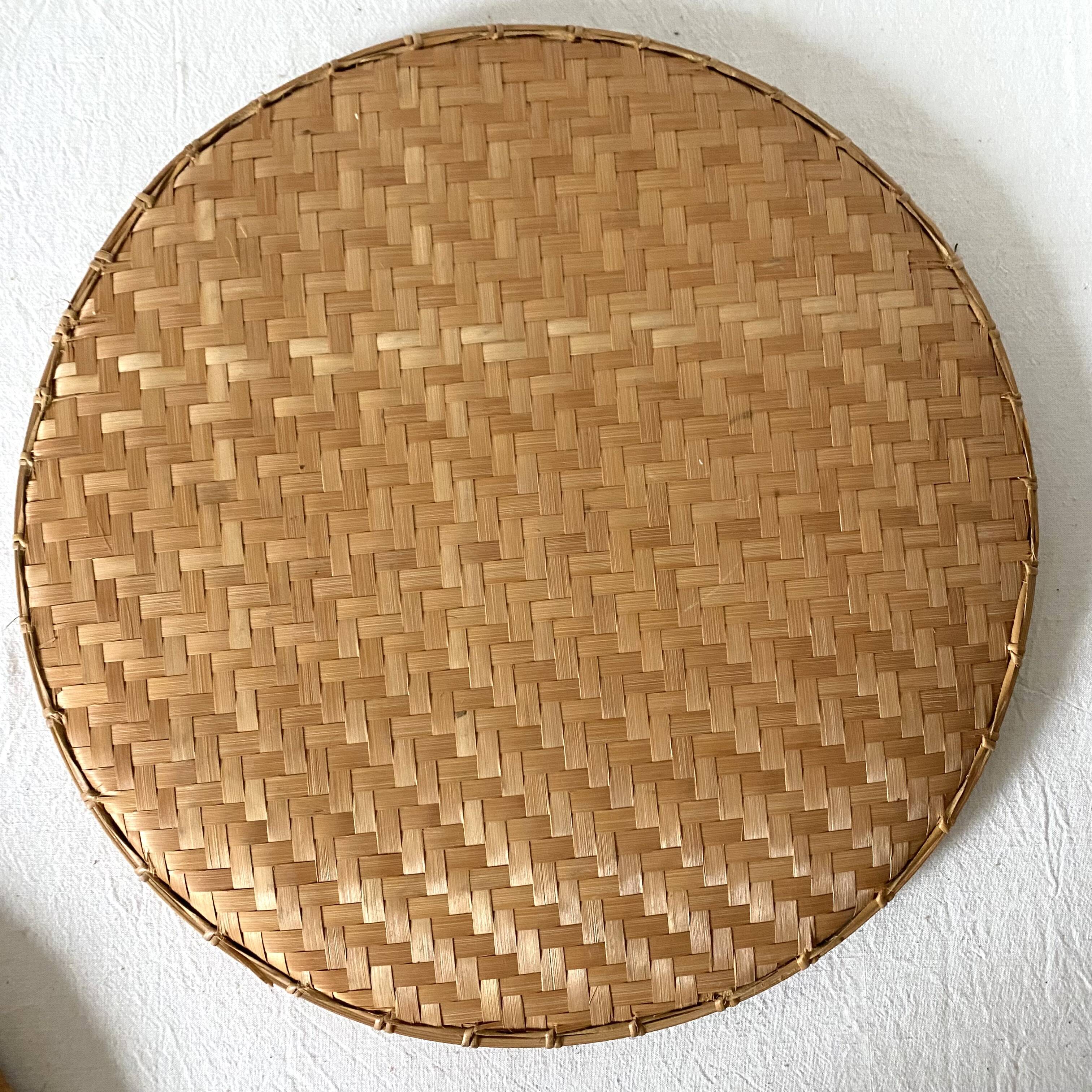 Round nesting trays in woven bamboo