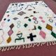 Tapis berbère Beni Ouarain 300x200 cm – Laine écrue motifs symboliques