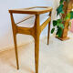 Small contemporary console in stained walnut wood.