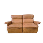 Vintage two-seater cognac leather sofa
