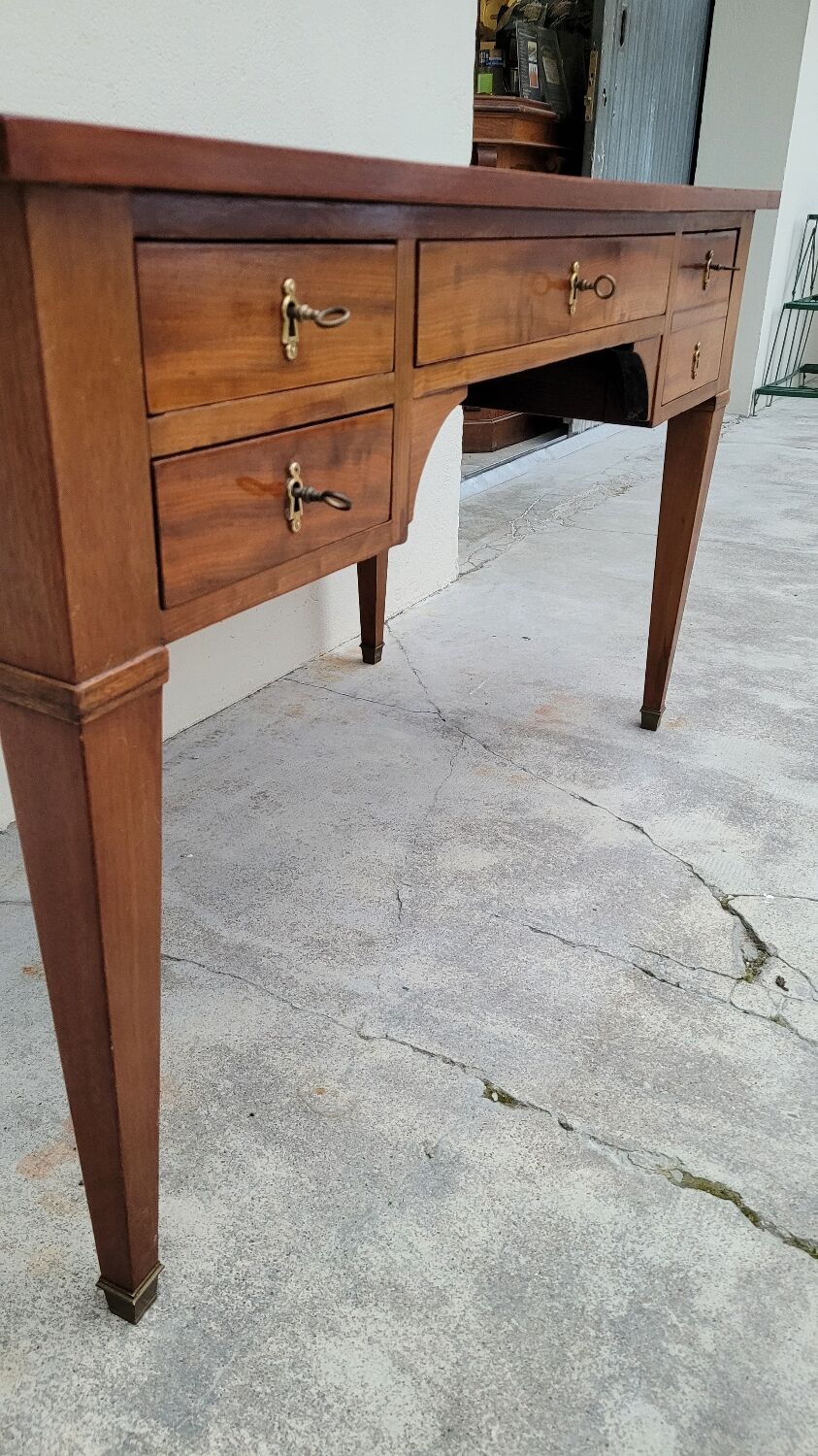 Louis XVI style flat desk in 19th century mahogany