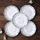 Antique ironstone plates from St Amand with a garland