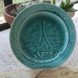 Cracked earthenware plate the Eiffel Tower