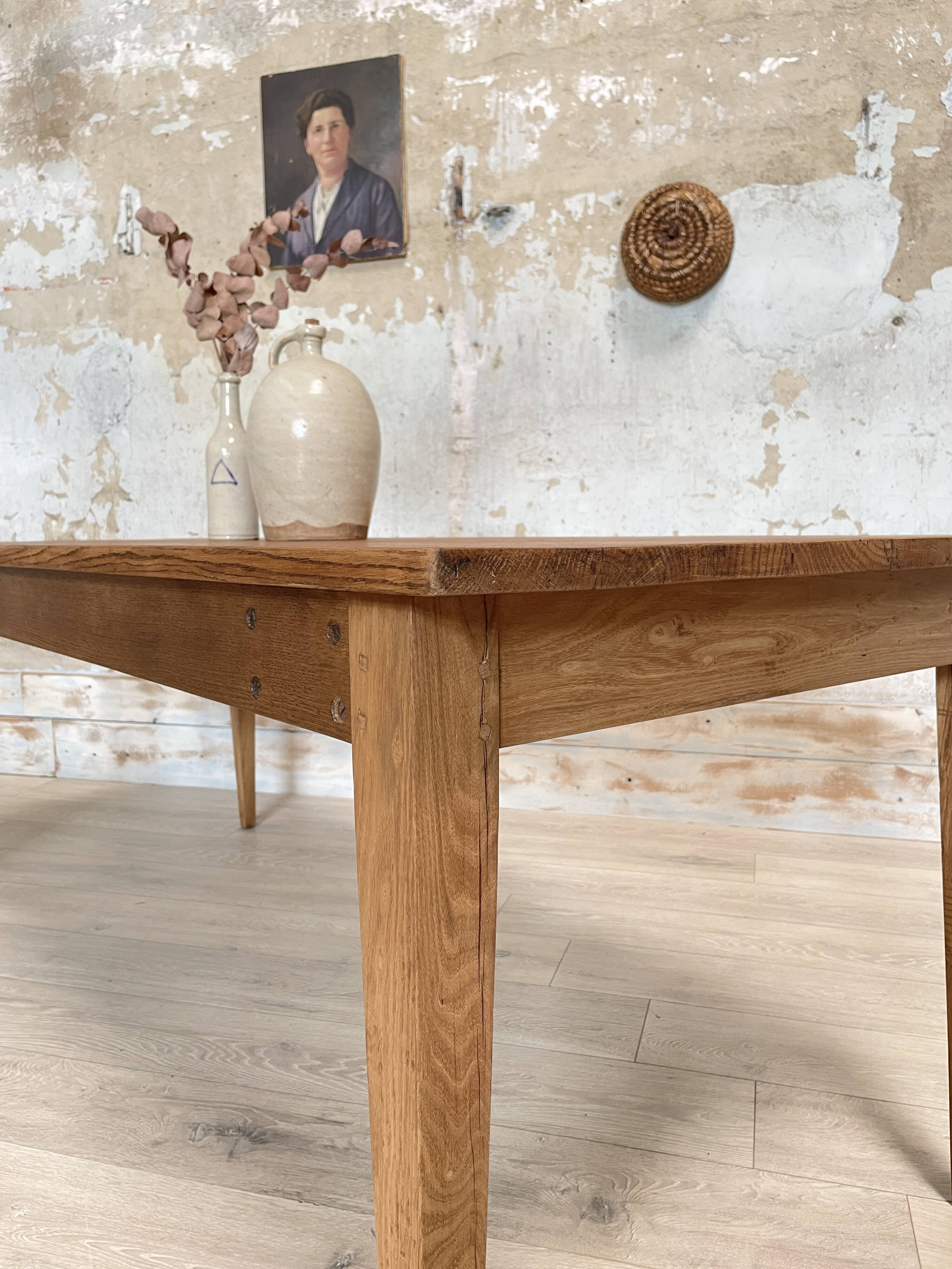 Vintage farm table with spindle legs.